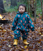 A child wearing the Little Green Radicals Sherpa Fleece Snowsuit , a Organic Cotton suit with a Red Foxes all over print on a dark green background. This lined snowsuit is a part of a wide range of organic cotton clothing for children available here at Babipur. 
