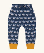 Little Green Radicals navy singing whales print comfy organic cotton joggers with yellow leg cuffs. 