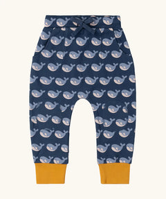 Little Green Radicals navy singing whales print comfy organic cotton joggers with yellow leg cuffs. 