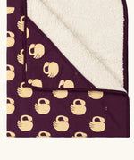 Close up of the Little Green Radicals sleeping swans organic sherpa hooded baby blanket.