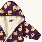 Close up of the inside of the Little Green Radicals purple sleeping swans print sherpa lined snowsuit.