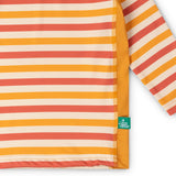 Close up of the striped front on the Little Green Radicals sorbet striped UPF 50 sunsafe long sleeve rash vest. Yellow gold, cream and light red stripes.