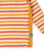Close up of the striped front on the Little Green Radicals sorbet striped UPF 50 sunsafe long sleeve rash vest. Yellow gold, cream and light red stripes.