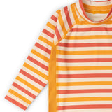 Close up of the striped front and arms on the Little Green Radicals sorbet striped UPF 50 sunsafe long sleeve rash vest. Yellow gold, cream and light red stripes.