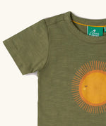 Green t-shirt with a sun design on a white background