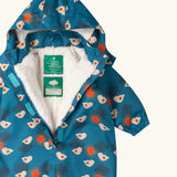 Close up of the Little Green Radicals sun birds recycled waterproof winter all in one suit unzipped showing the fleece lining. Blue background with white birds and orange sun. 