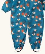 Close up of the foot straps on the Little Green Radicals sun birds recycled waterproof winter all in one suit. Blue background with white birds and orange sun. 