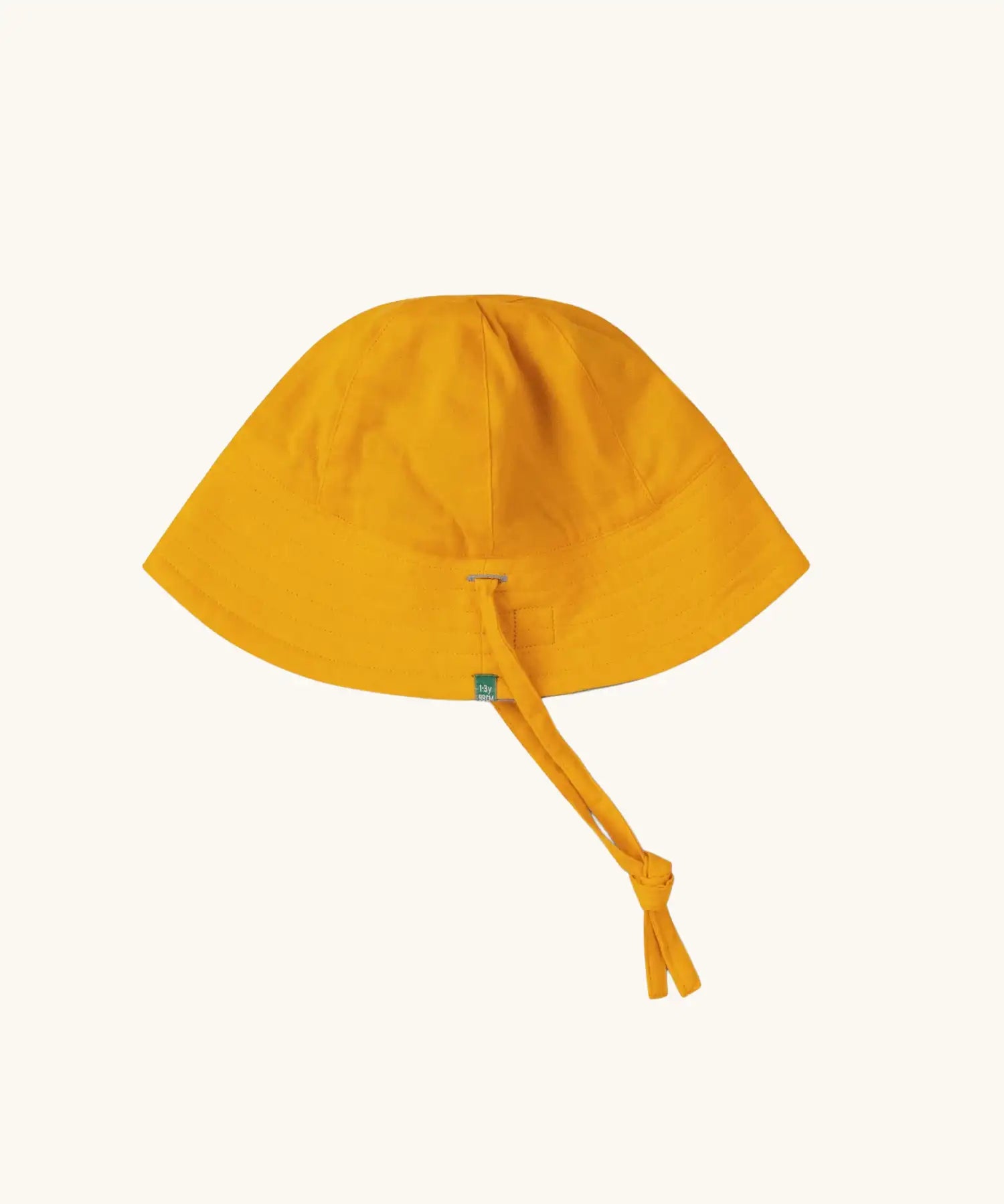 Little Green Radicals summer sun reversible sunhat shown on the yellow gold side. 