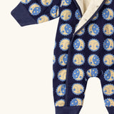 Close up of the Little Green Radicals sun folk blue sherpa fleece lined snowsuit.