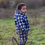 Young child wearing a Little Green Radicals sun folk blue sherpa fleece lined snowsuit.