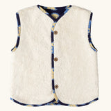 Sherpa fleece side of the Little Green Radicals sun folk organic cotton sherpa fleece reversible gilet.