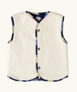 Sherpa fleece side of the Little Green Radicals sun folk organic cotton sherpa fleece reversible gilet.