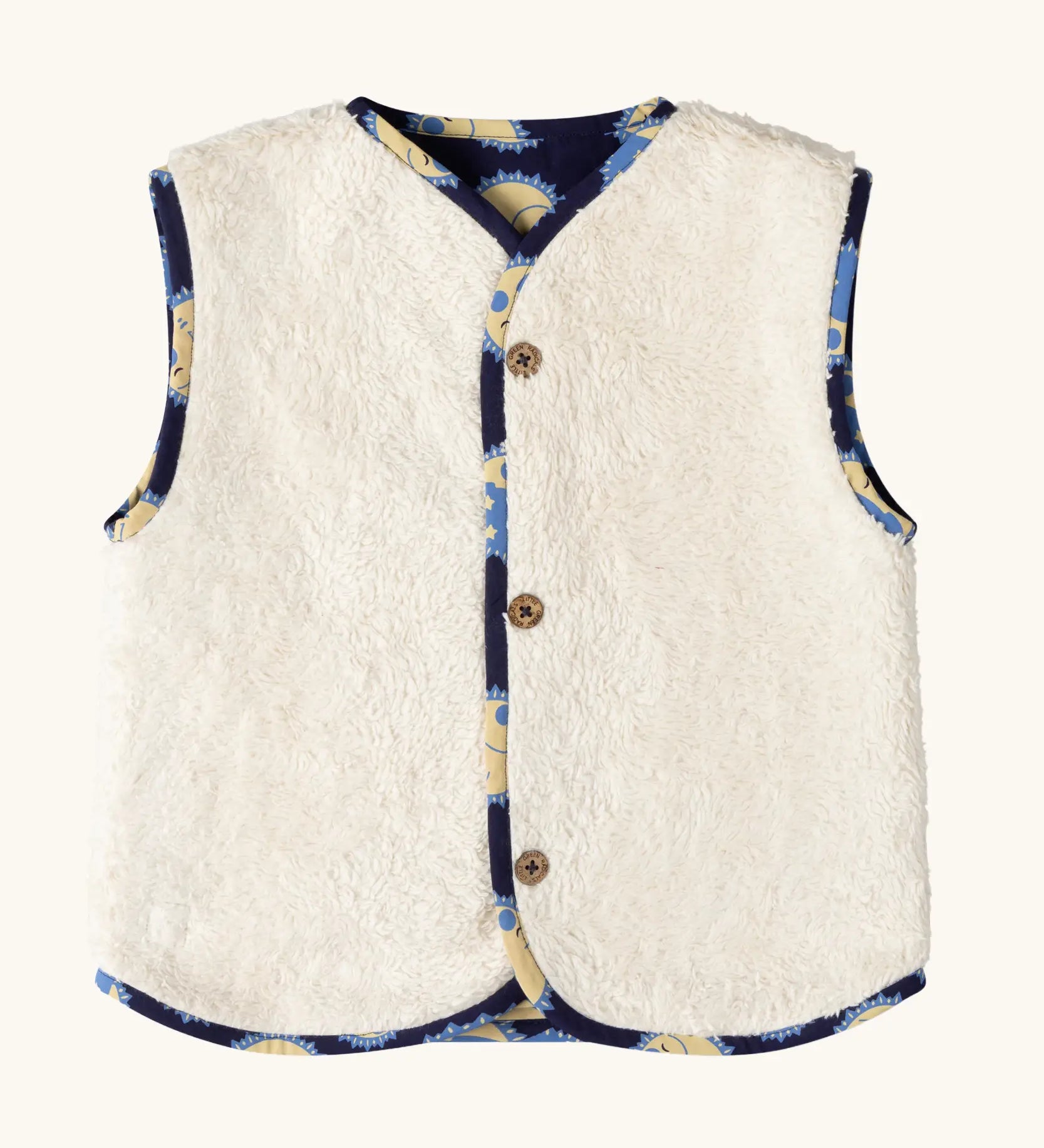 Sherpa fleece side of the Little Green Radicals sun folk organic cotton sherpa fleece reversible gilet.