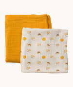 A Little Green Radicals Sunshine & Rainbows Organic Baby Muslin Set. A  2 Pack of muslin cloths, one is plain yellow gold and the other has an all over print featuring rainbows, sun and rainbow rain clouds. Little green Radicals have a wide range of organic cotton, Fairtrade children's clothing and outerwear available here at Babipur.