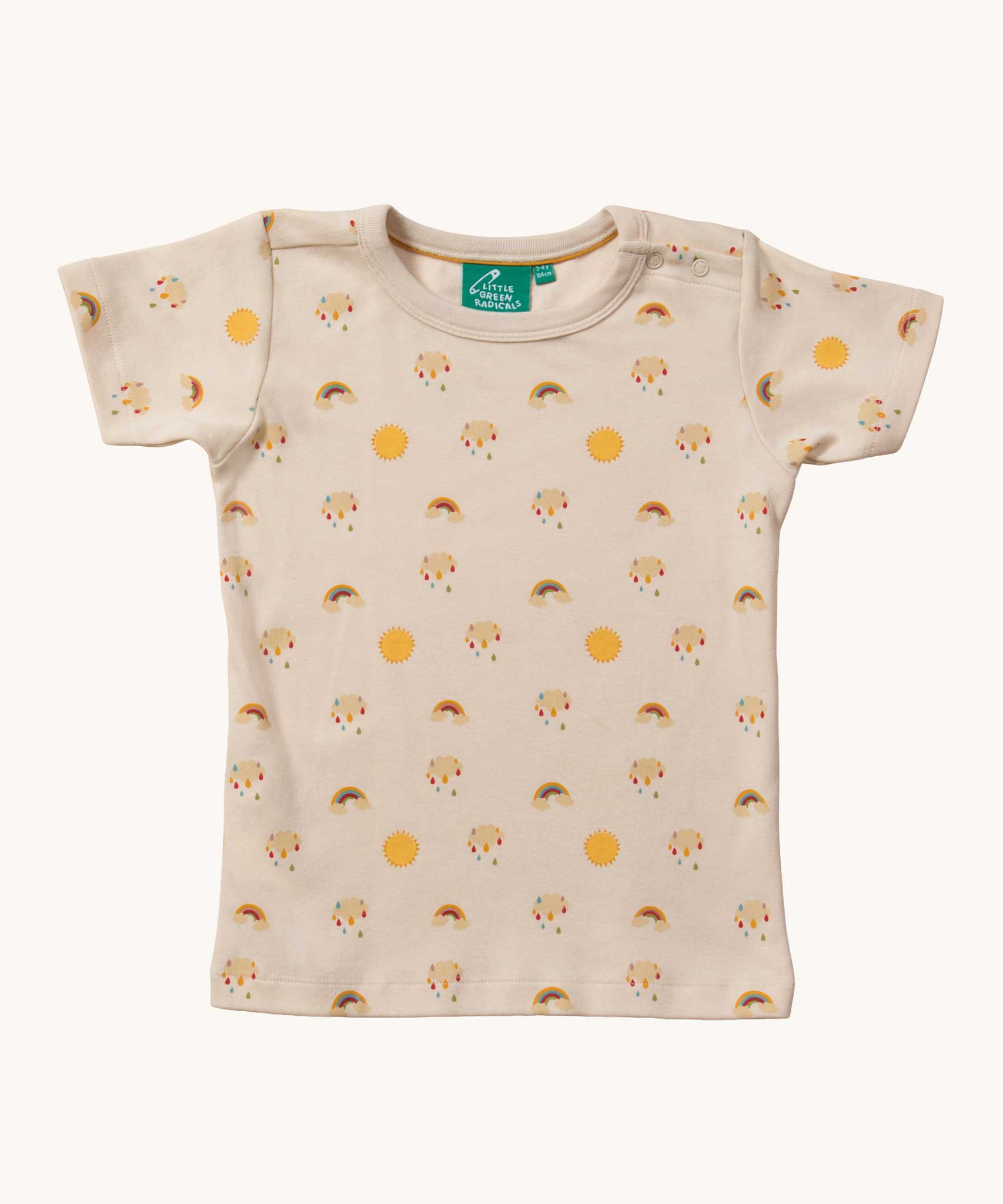 Little Green Radicals Sunshine & Rainbows Short Sleeve organic cotton T-Shirt. An off white, cream coloured t-shirt with an all over print featuring rainbows, sunshine and rainbow rainclouds. Little green Radicals have a wide range of organic cotton, Fairtrade children's clothing and outerwear available here at Babipur.