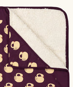 Close up of the Little Green Radicals swans organic sherpa hooded baby blanket.