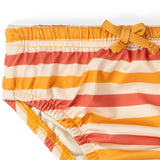 Close up of the elasticated waist with yellow tie on the Little Green Radicals Sorbet Striped Reusable Swimming Nappy. Cream, Red and yellow stripes.