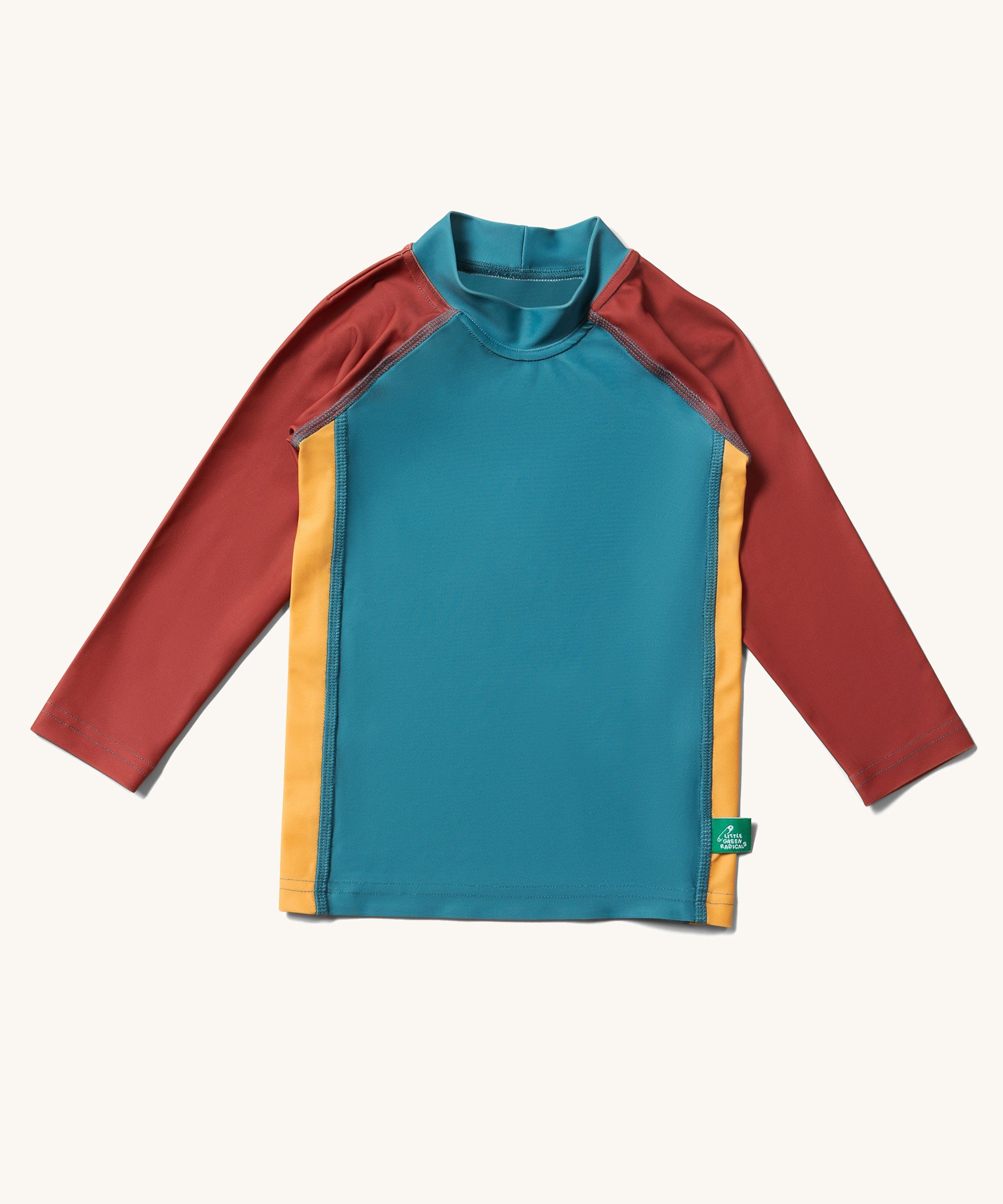 Little Green Radicals Teal Colour Block UPF 50+ Sunsafe Long Sleeve Rash Vest. The rash vest has a eal colour middle panel, with yellow gold sides and burgundy coloured sleeves.