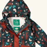 Close up of the Little Green Radicals woodland world green recycled waterproof fleece lined adventure winter coat. Dark green coat with woodland themed print featuring animals, trees, birds and mushrooms.