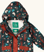 Close up of the Little Green Radicals woodland world green recycled waterproof fleece lined adventure winter coat. Dark green coat with woodland themed print featuring animals, trees, birds and mushrooms.