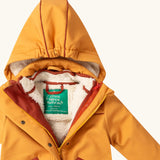 Close up of the Little Green Radicals  yellow gold recycled waterproof 3 in 1 coat showing the hood. Yellow gold waterproof coat with a removable fleece layer inside. 