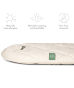 A side view of the Little Green Sheep Moses Basket Mattress