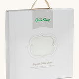 Little Green Sheep Organic Single Jersey Fitted Sheet in the packaging pictured on a plain background