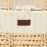 close up of the linen Little Green Sheep Organic Knitted Moses Basket & Mattress
