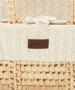 close up of the linen Little Green Sheep Organic Knitted Moses Basket & Mattress
