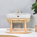 Little Green Sheep Moses Basket Rocking Stand with a quilted lined moses basket placed inside