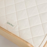 A close up of the Little Green Sheep twist mattress