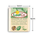 LoofCo Lime scented Washing-Up Dish Soap Bar in paper sleeve pictured on a plain white background with product dimensions. 60mm by 65mm approximate