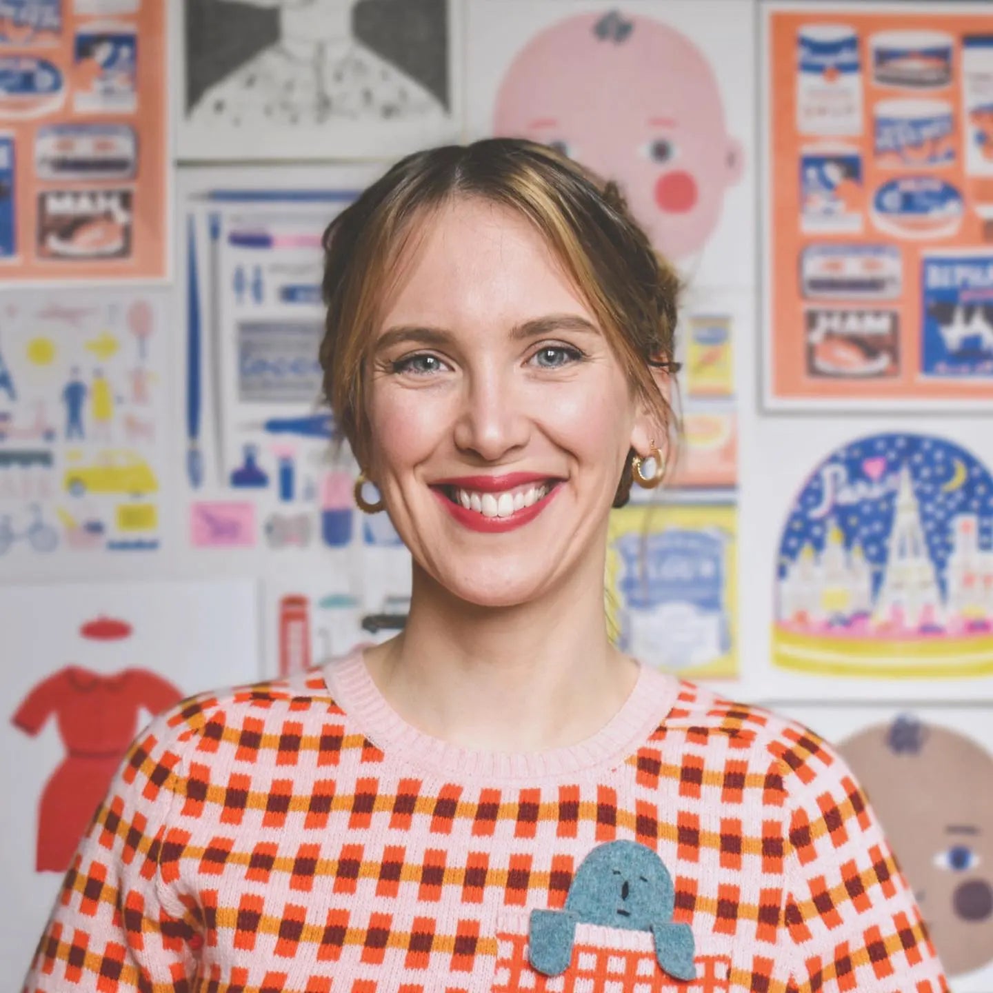 Louise Lockhart portrait in her art studio. Independent UK artist and illustrator creating handmade products. 