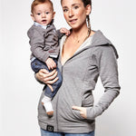  with a child inside showing the wrap-over chest cover. On a cream background