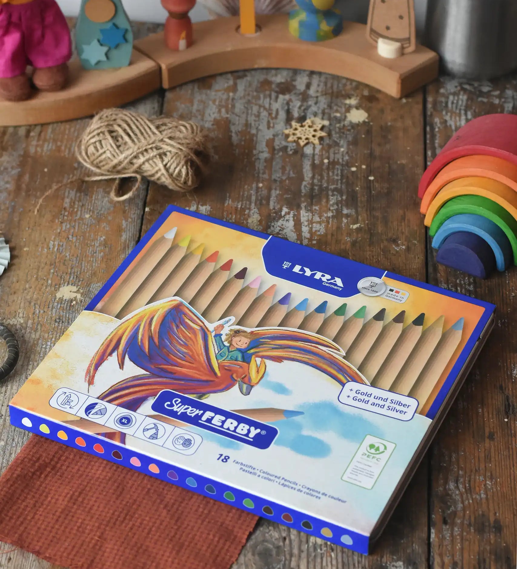 Lyra 18 standard colour triangular Super Ferby pencil set in their cardboard box packaging.