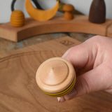 Bottom of the Mader bee spinning top. 