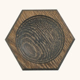 Mader handcrafted black oak spinning top plate in a shape of a hexagon. Plate measure 8cm