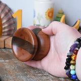 Mader free wheel butterfly yoyo placed in an adult hand. 