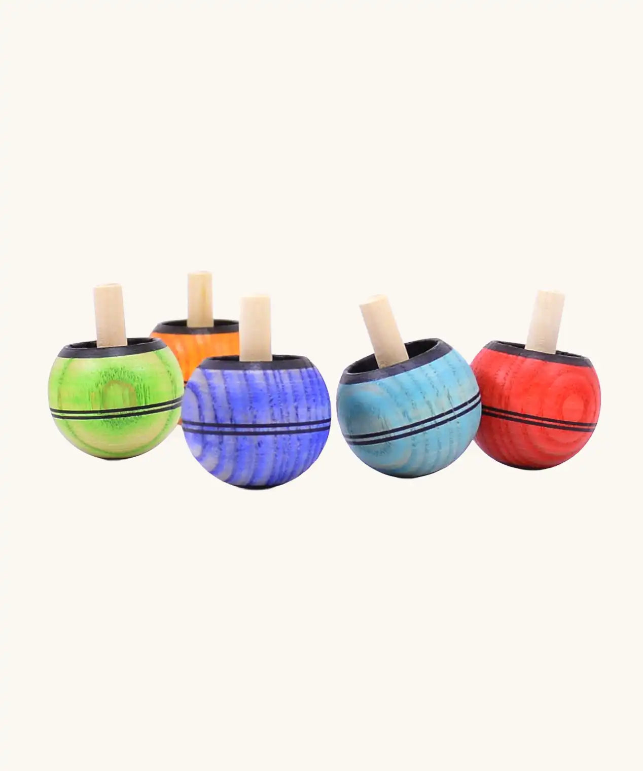 Five Mader Kreiselmanufaktur round ash turn over spinning top toys in various colours. Green, orange, blue, light blue and red.