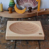 Mader ash medium wooden spinning plate 15cm placed on a wooden surface in the Babipur playroom.