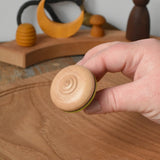 Bottom of the Mader Monalotte Spinning Top.