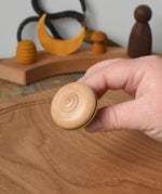 Bottom of the Mader Monalotte Spinning Top.