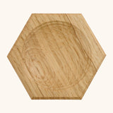Mader handcrafted small oak spinning top plate in a shape of a hexagon. Plare measure 8cm