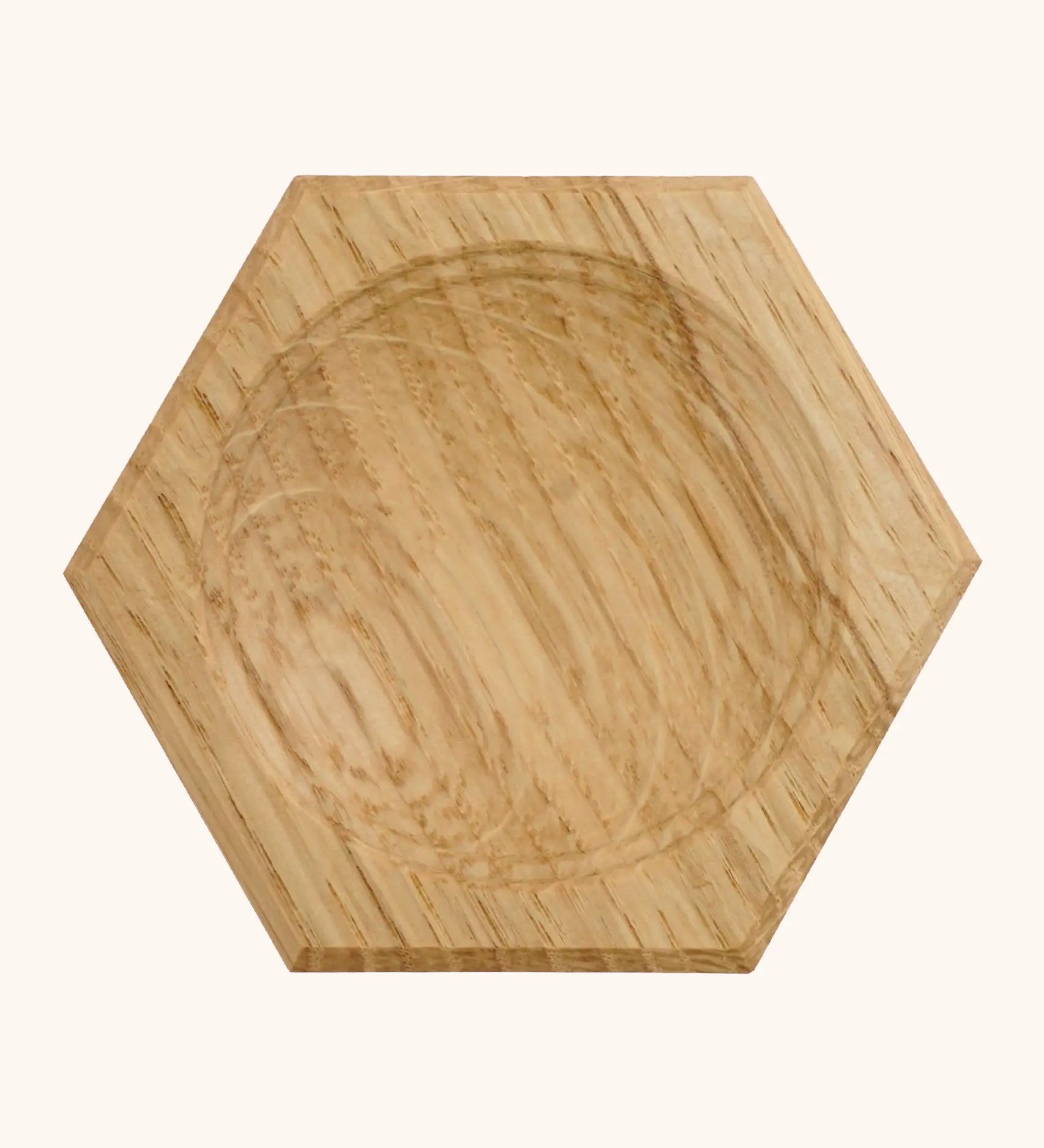 Mader handcrafted small oak spinning top plate in a shape of a hexagon. Plare measure 8cm