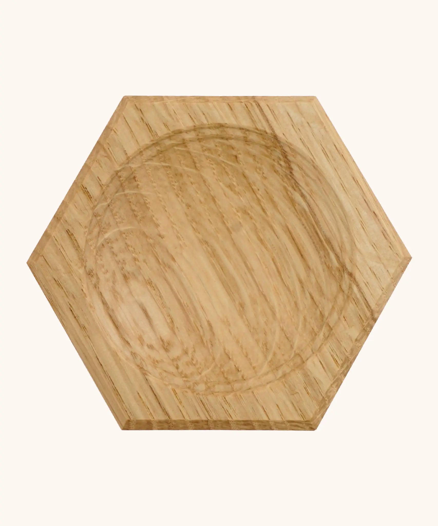 Mader handcrafted small oak spinning top plate in a shape of a hexagon. Plare measure 8cm