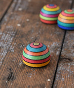 Mader striped wooden magnet placed on a desk in the Babipur playroom.