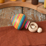 Mader Kreiselmanufaktur Ring Spinning Top placed on a wooden surface in the Babipur playroom.