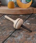Mader Salto Totale wooden spinning to placed on a desk in the Babipur playroom.