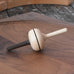 Mader Salto Totale wooden spinning to placed on a walnut spinning plate in the Babipur playroom.