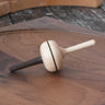 Mader Salto Totale wooden spinning to placed on a walnut spinning plate in the Babipur playroom.